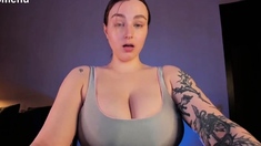 Big ass babe exposes her big boobs