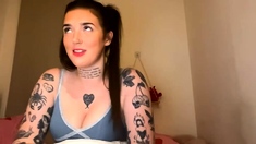 Busty curly brunette with big boobs fucks on couch