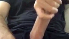 Muscular amateur strokes his big hard cock with a thick bell