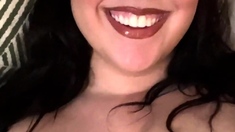 Busty curly brunette with big boobs fucks on couch