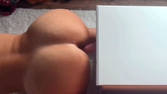 Big-Assed MILF Masturbates with Dildo for Intense Orgasm on